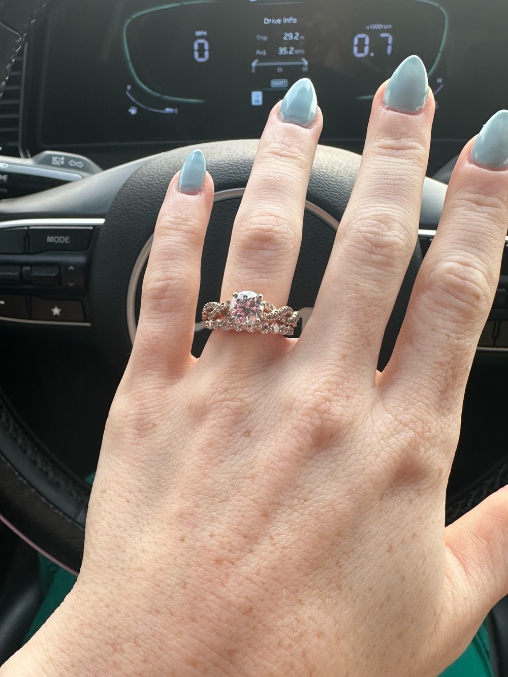 Rose Gold Engagement Ring with Clear Center Stone